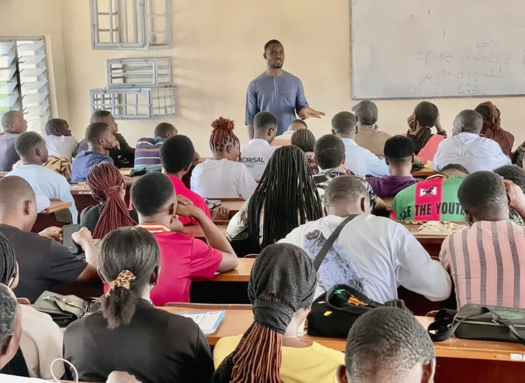 A facilitator speaking to a full classroom